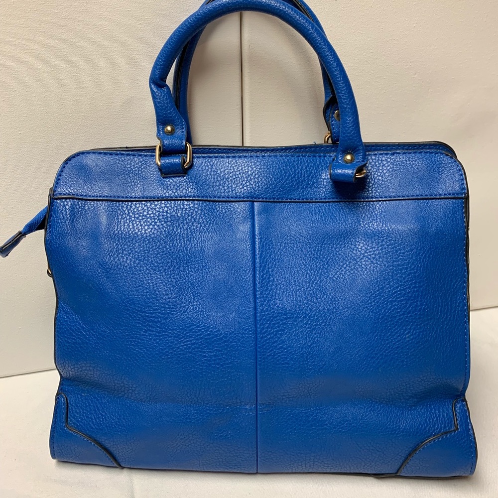 Adorable blue bag with orange lining